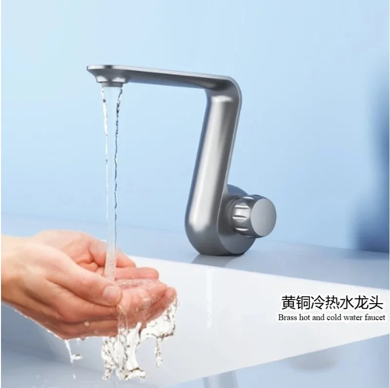 Bathroom cabinet wash basin hot and cold faucet, white imitation swan design, brass faucet
Bathroom cabinet wash basin hot and cold faucet, white imitation swan design, brass faucet