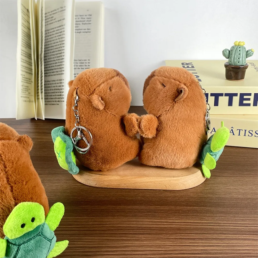 Cute Soft Capybara Key Ring Pulling Rope Doll Good Luck Plush Animal Pendant Fur PP Cotton Rotating Turtle Shell Toy Couple
Cute Soft Capybara Key Ring Pulling Rope Doll Good Luck Plush Animal Pendant Fur PP Cotton Rotating Turtle Shell Toy Couple