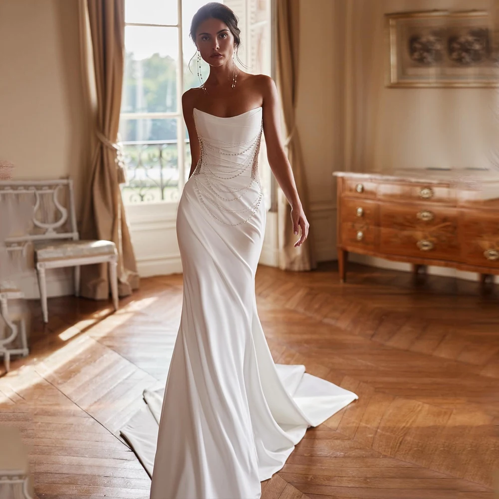 Mermaid Wedding Dresses Sexy Strapless Sleeveless Illusion Back Sweep Train Beaded Bridal Gown Customized Simple Bride Dresses
Mermaid Wedding Dresses Sexy Strapless Sleeveless Illusion Back Sweep Train Beaded Bridal Gown Customized Simple Bride Dresses
