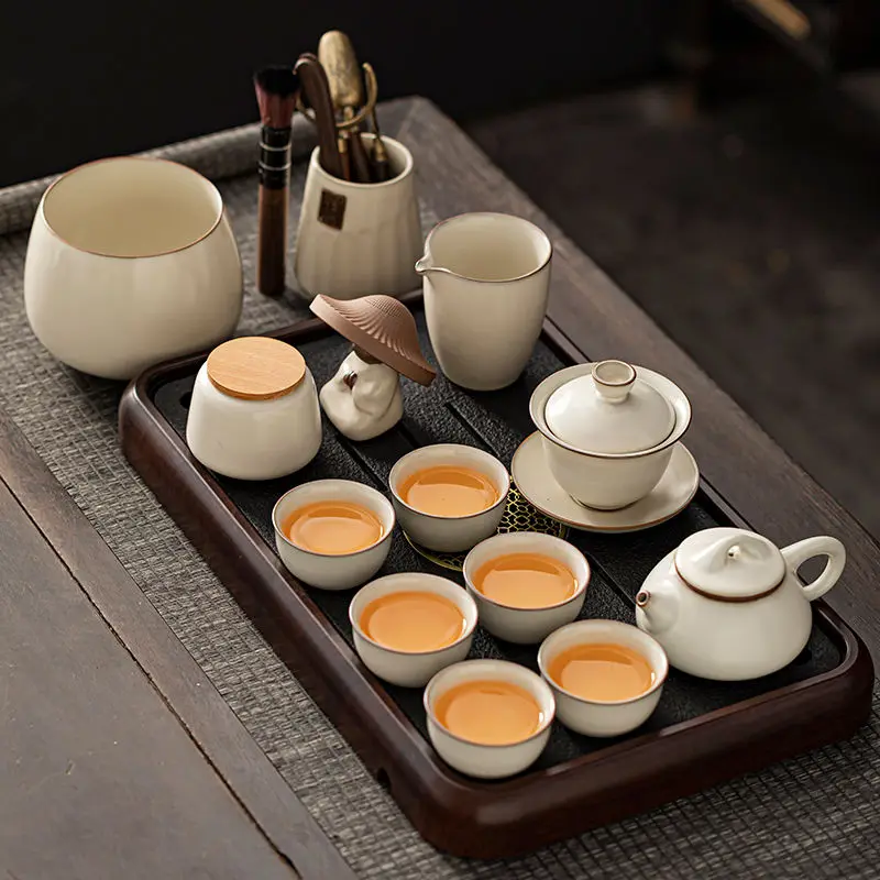 Artisan Beige Ru Kiln Tea Set: Ceramic Teapot, Cups, and Tray – A Touch of Chinese Heritage"
Artisan Beige Ru Kiln Tea Set: Ceramic Teapot, Cups, and Tray – A Touch of Chinese Heritage"