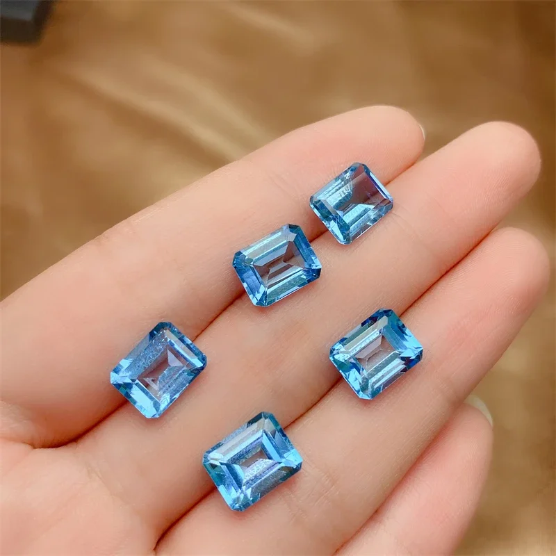 Natural Swiss Blue Topaz Loose Stone for Jewelry Shop VVS 8mm * 10mm Emerald Cut Topaz Gemstone Real
Natural Swiss Blue Topaz Loose Stone for Jewelry Shop VVS 8mm * 10mm Emerald Cut Topaz Gemstone Real