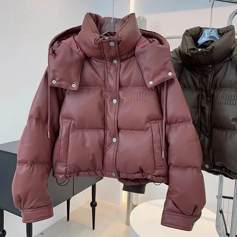 Fashionable Short Padded Jacket Women's PU Leather Hooded down Cotton Coat Protein Leather Winter Trend Commute Korean Style
Fashionable Short Padded Jacket Women's PU Leather Hooded down Cotton Coat Protein Leather Winter Trend Commute Korean Style