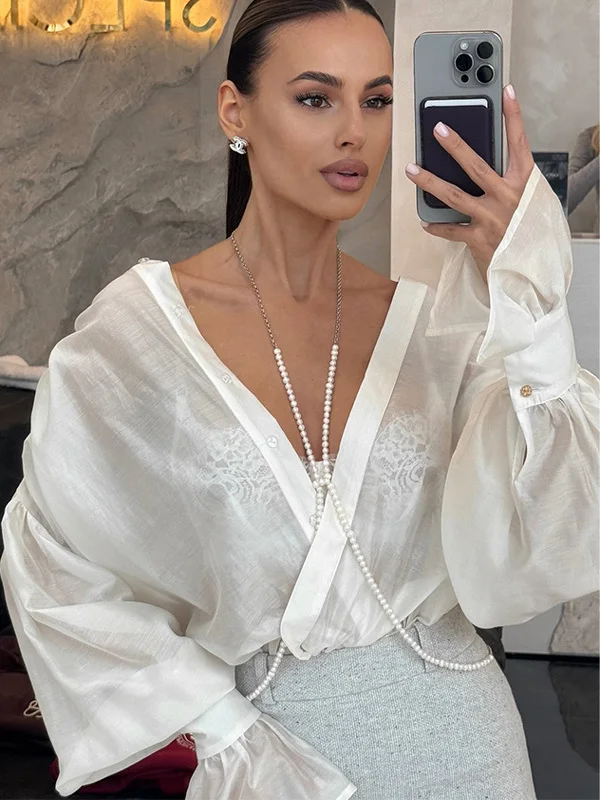 Длинная свободная блузка с отложным воротником и рукавами-фонариками, женская, модная, китайского производства, весенняя...
Длинная свободная блузка с отложным воротником и рукавами-фонариками, женская, модная, китайского производства, весенняя...