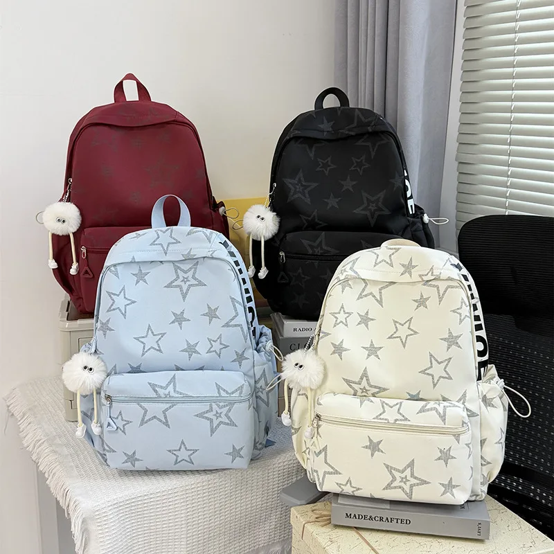 Lightweight nylon color-blocking star student backpack, cute pendant, large-capacity waterproof travel computer backpack
Lightweight nylon color-blocking star student backpack, cute pendant, large-capacity waterproof travel computer backpack