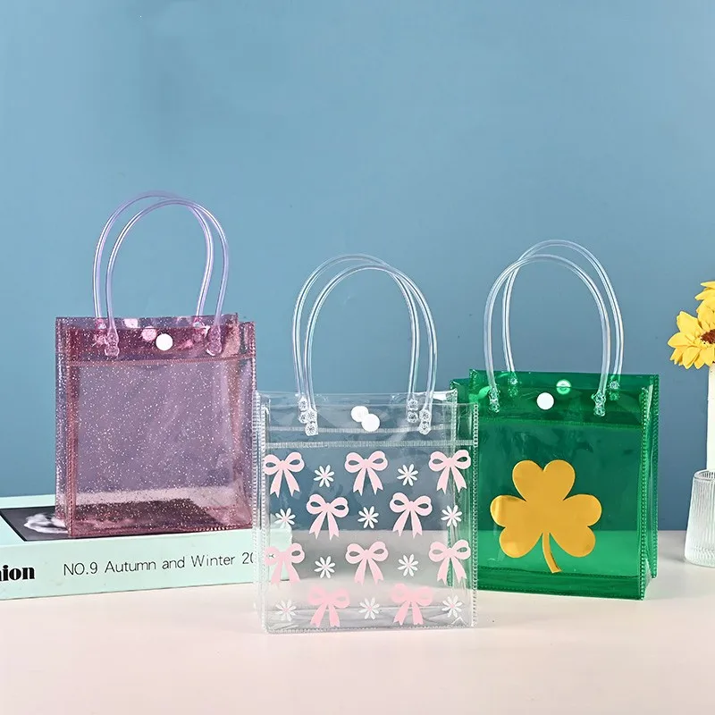 Cute Bow Transparent PVC Tote Bag Gift Packaging Bag Christmas Children Handbag With Snap Festival Party Decoration Supplies
Cute Bow Transparent PVC Tote Bag Gift Packaging Bag Christmas Children Handbag With Snap Festival Party Decoration Supplies