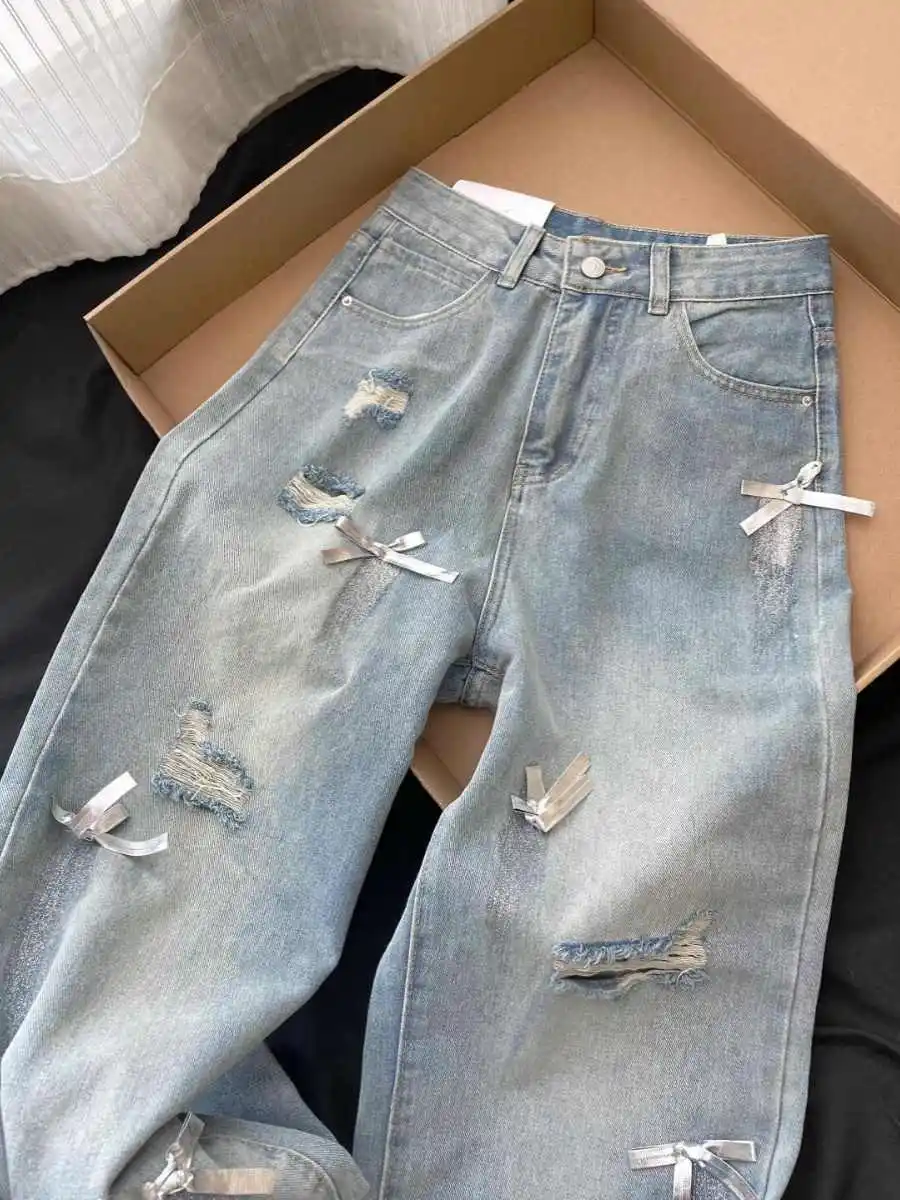 Summer Women Ripped Jeans High Waist Zipper Bow Applique Hole Straight Leg Trousers Korean Fashion Sweet Female Denim Pants
Summer Women Ripped Jeans High Waist Zipper Bow Applique Hole Straight Leg Trousers Korean Fashion Sweet Female Denim Pants
