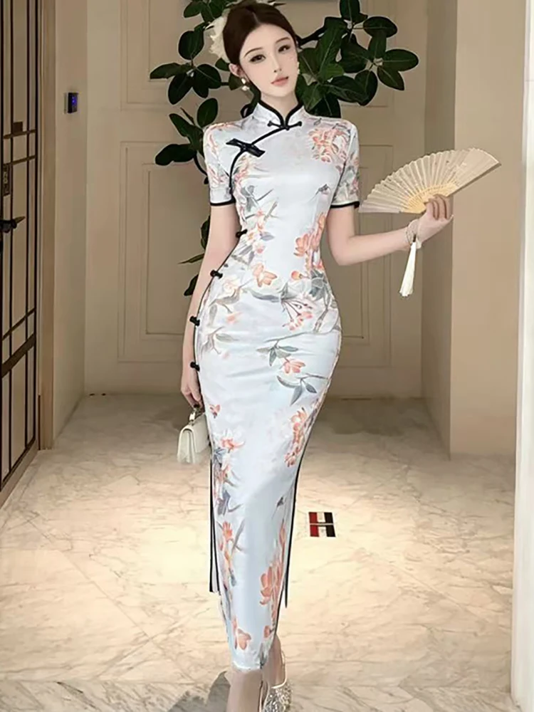 Women Vintage Floral Short Sleeve Stand Collar Long Dress 2026 Korean Elegant Luxury Slit Dress Summer Bodycon Cheongsam Dresses
Women Vintage Floral Short Sleeve Stand Collar Long Dress 2026 Korean Elegant Luxury Slit Dress Summer Bodycon Cheongsam Dresses