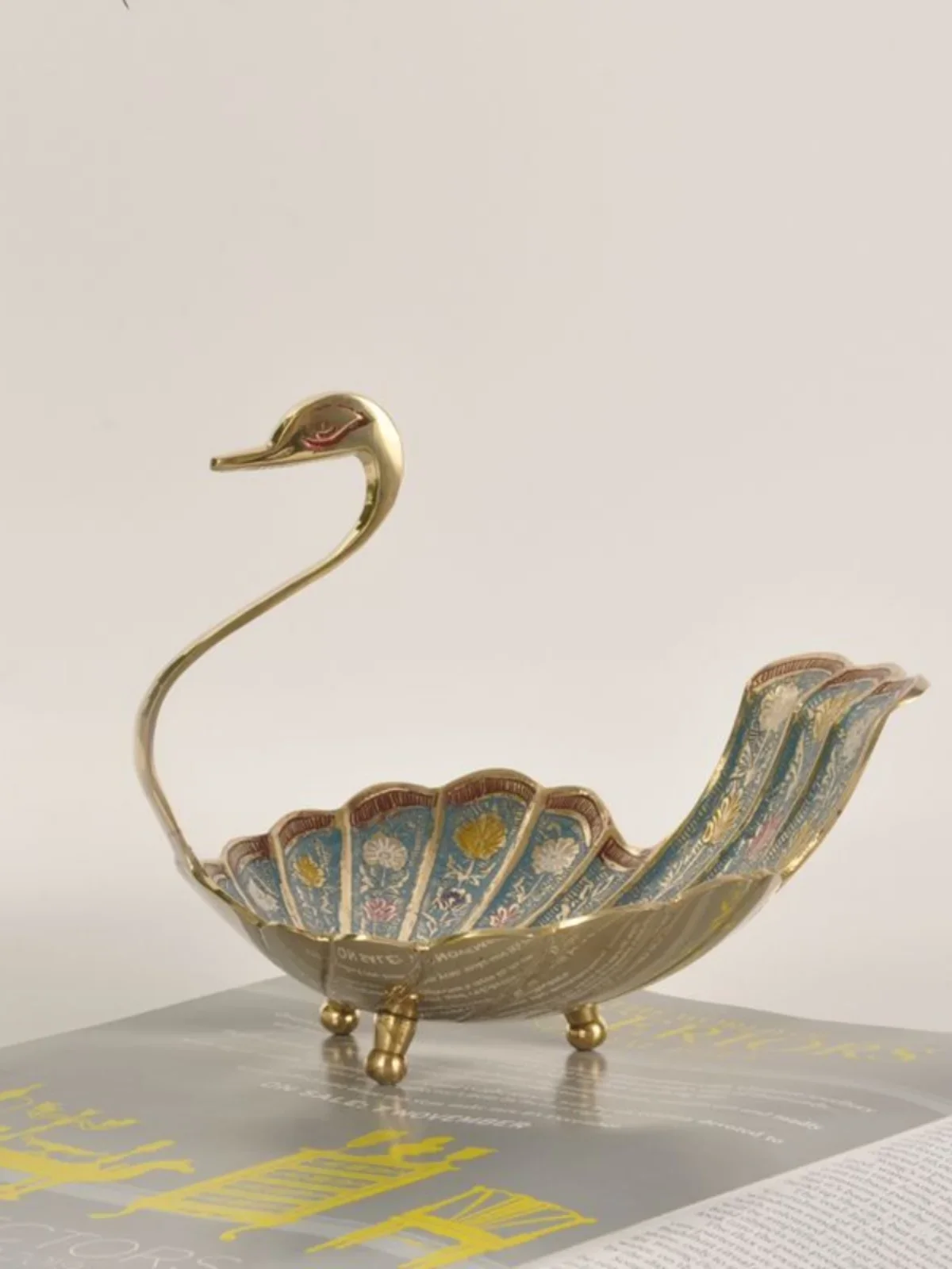 India imported brass fruit plate swan American light luxury home snacks dried fruit plate desktop coffee table handicraft orname
India imported brass fruit plate swan American light luxury home snacks dried fruit plate desktop coffee table handicraft orname