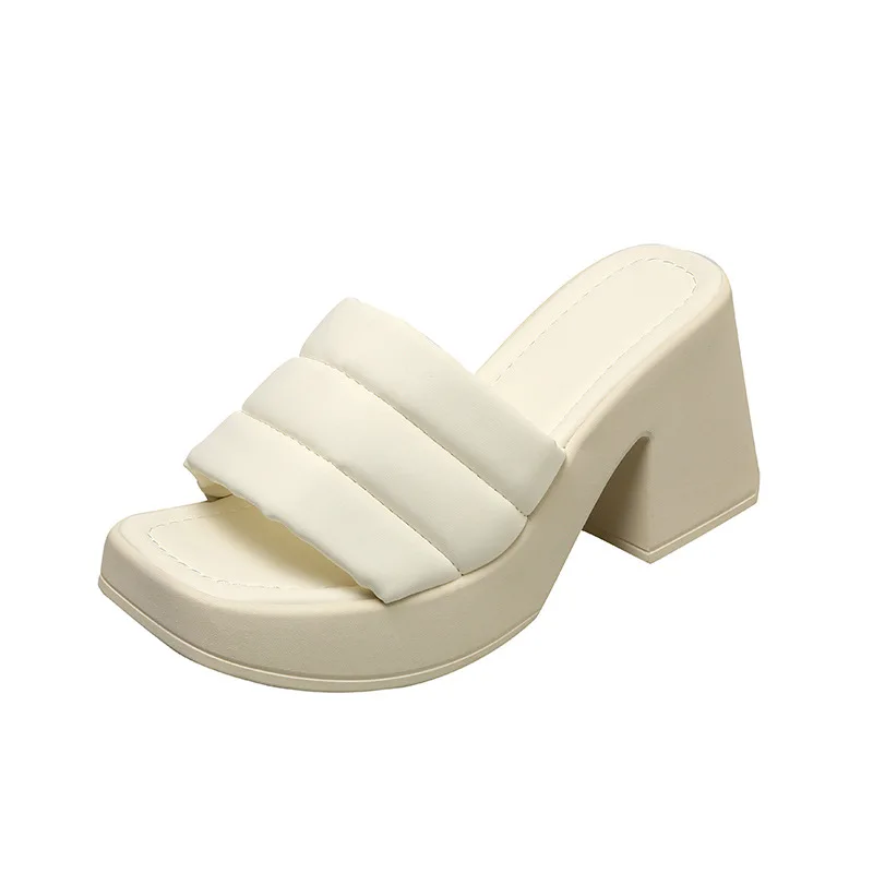 The new fashionable height-increasing high-heeled slippers feature a straight square head, thick heels and a sponge cake base
The new fashionable height-increasing high-heeled slippers feature a straight square head, thick heels and a sponge cake base
