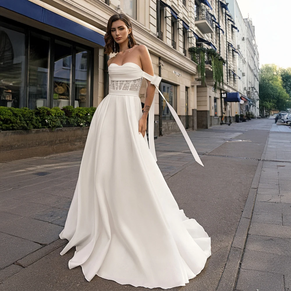 Customized Satin A Line Bridal Dress With Lace Waist Detail Detachable Sash And Chapel Train Classic Wedding Dress For Bride
Customized Satin A Line Bridal Dress With Lace Waist Detail Detachable Sash And Chapel Train Classic Wedding Dress For Bride