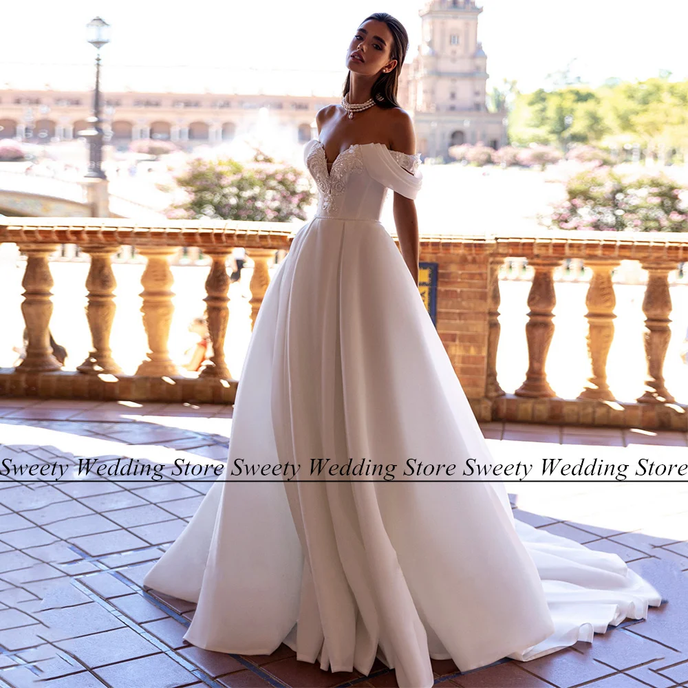Sexy Off The Shoulder V Neck Organza Wedding Dresses Beading Applique Pearls A Line Robe De Mariee Sweep Train Bridal Gowns
Sexy Off The Shoulder V Neck Organza Wedding Dresses Beading Applique Pearls A Line Robe De Mariee Sweep Train Bridal Gowns