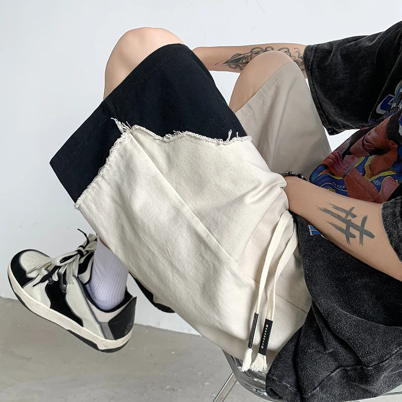 Мужские летние шорты в стиле ретро-американского кэжуал-костюма, модные, свободного кроя, с асимметричными вставками и дырками
Мужские летние шорты в стиле ретро-американского кэжуал-костюма, модные, свободного кроя, с асимметричными вставками и дырками