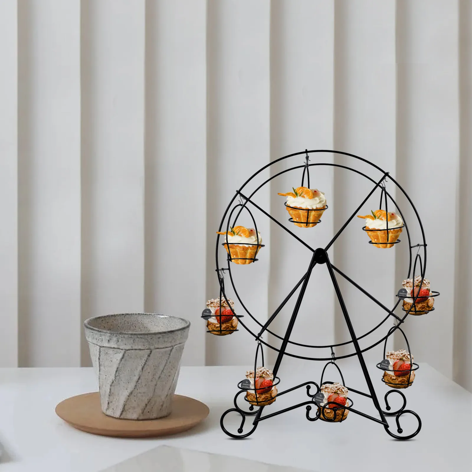 1Pcs Metal Cake Stand Elegant Ferris Wheel Shape Dessert Display Holder for Wedding Birthday Party Hotel Decor Use
1Pcs Metal Cake Stand Elegant Ferris Wheel Shape Dessert Display Holder for Wedding Birthday Party Hotel Decor Use