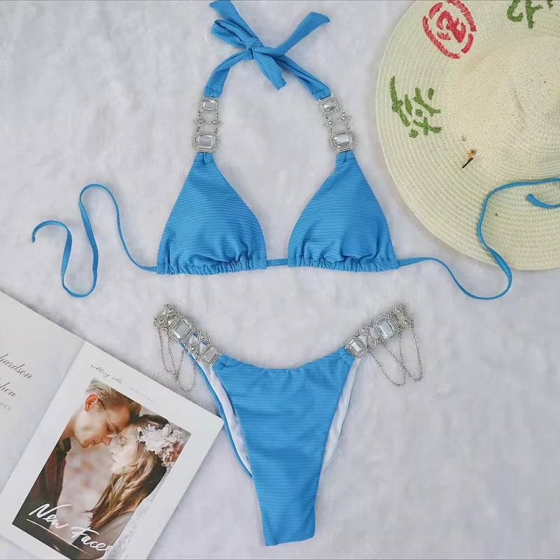 Sexy bikini swimsuit in solid color, two-piece with straps and metal crystal accessories, women's swimwear
Sexy bikini swimsuit in solid color, two-piece with straps and metal crystal accessories, women's swimwear