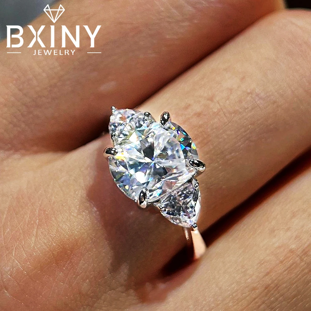 BXINY 4Carat Cushion Cut Moissanite Ring Pure S925 Silver For Women 3-Stone Triangle Side Diamond Wedding Band Fine Jewelry Gift
BXINY 4Carat Cushion Cut Moissanite Ring Pure S925 Silver For Women 3-Stone Triangle Side Diamond Wedding Band Fine Jewelry Gift
