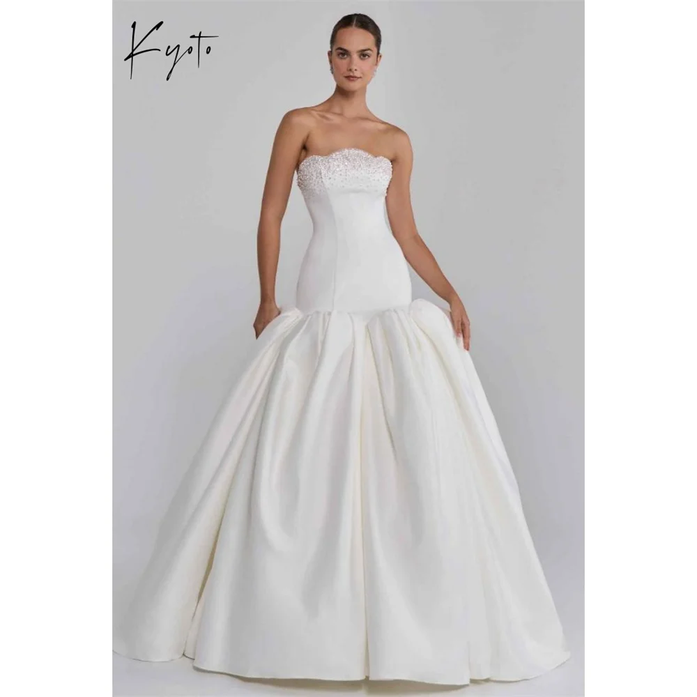 Kyoto Customized White Satin Strapless Wedding Dress Sleeveless Zip Back vestidos de noiva Elegant A-Line Evening Dress 2025
Kyoto Customized White Satin Strapless Wedding Dress Sleeveless Zip Back vestidos de noiva Elegant A-Line Evening Dress 2025