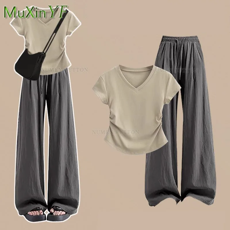 2025 Korean Elegant Summer New Casual Tracksuit Matching Set Women Chic Short Sleeved T-shirt+Wide Leg Pants Two-piece Suit
2025 Korean Elegant Summer New Casual Tracksuit Matching Set Women Chic Short Sleeved T-shirt+Wide Leg Pants Two-piece Suit