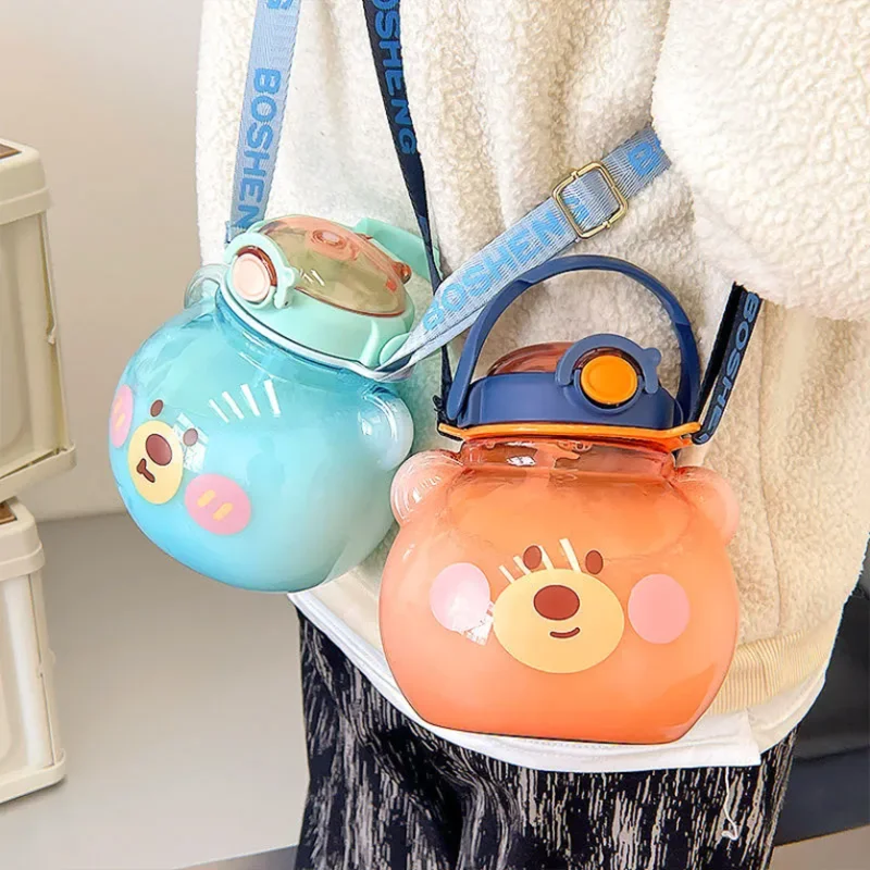Kawaii Round Bear Plastic Water Bottle With Straw Portable Strap Gift for Girl Kids Outdoor Large Capacity Milk Bubble Bottles
Kawaii Round Bear Plastic Water Bottle With Straw Portable Strap Gift for Girl Kids Outdoor Large Capacity Milk Bubble Bottles