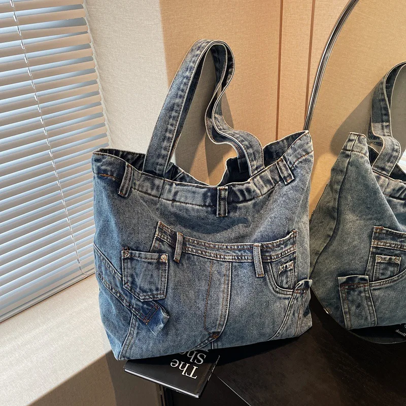 Retro style women's large capacity washing denim tote bag luxury designer 2025 versatile cutting decorative armpit shoulder bag
Retro style women's large capacity washing denim tote bag luxury designer 2025 versatile cutting decorative armpit shoulder bag