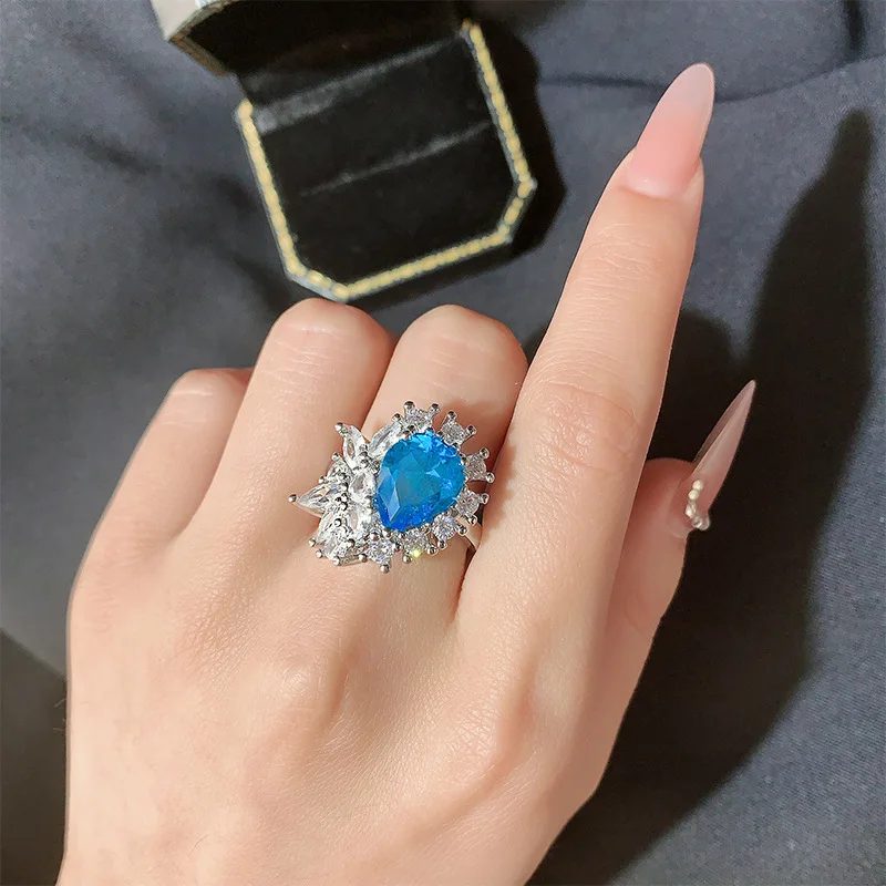 Кольцо из серебра 925 пробы с синим сапфиром, элегантное ювелирное изделие в форме капли для женщин, роскошный подарок, свадебное, помолвочное, изящное сверкающее кольцо
Кольцо из серебра 925 пробы с синим сапфиром, элегантное ювелирное изделие в форме капли для женщин, роскошный подарок, свадебное, помолвочное, изящное сверкающее кольцо