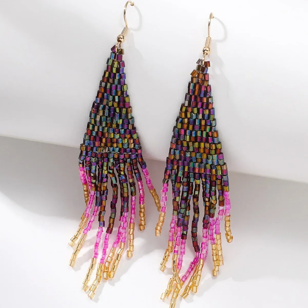 Beaded earrings Tassel Originality Show off colour Colour Hand knitting Bohemia Alloy Tide Simple Rice bead earrings
Beaded earrings Tassel Originality Show off colour Colour Hand knitting Bohemia Alloy Tide Simple Rice bead earrings