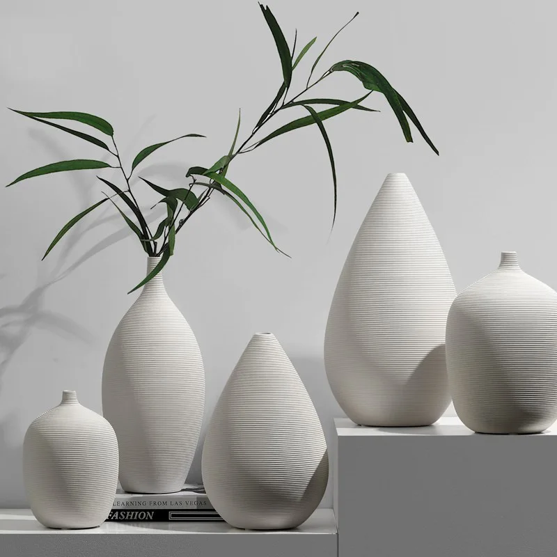 White ceramic dried flower vase ornament creative modern simple living room dining table flower arrangement home soft
White ceramic dried flower vase ornament creative modern simple living room dining table flower arrangement home soft