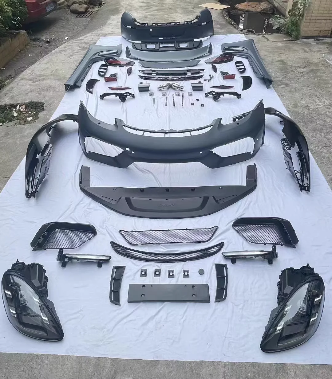 Body kit for Porsche 981 modified GT4 style Front Rear Bumper headlight taillight assembly Hood Fender tail wing Surround 
Body kit for Porsche 981 modified GT4 style Front Rear Bumper headlight taillight assembly Hood Fender tail wing Surround