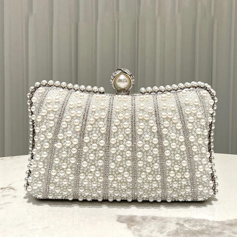 Жемчужная сумка ручной работы, роскошный женский банкетный клатч, элегантные вечерние сумки для дам, свадебная вечеринка, вечер
Жемчужная сумка ручной работы, роскошный женский банкетный клатч, элегантные вечерние сумки для дам, свадебная вечеринка, вечер