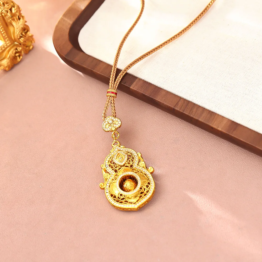 Sand gold inlaid zircon hollow gourd pendant necklace light luxury high-end fashion personality versatile sweater chain
Sand gold inlaid zircon hollow gourd pendant necklace light luxury high-end fashion personality versatile sweater chain