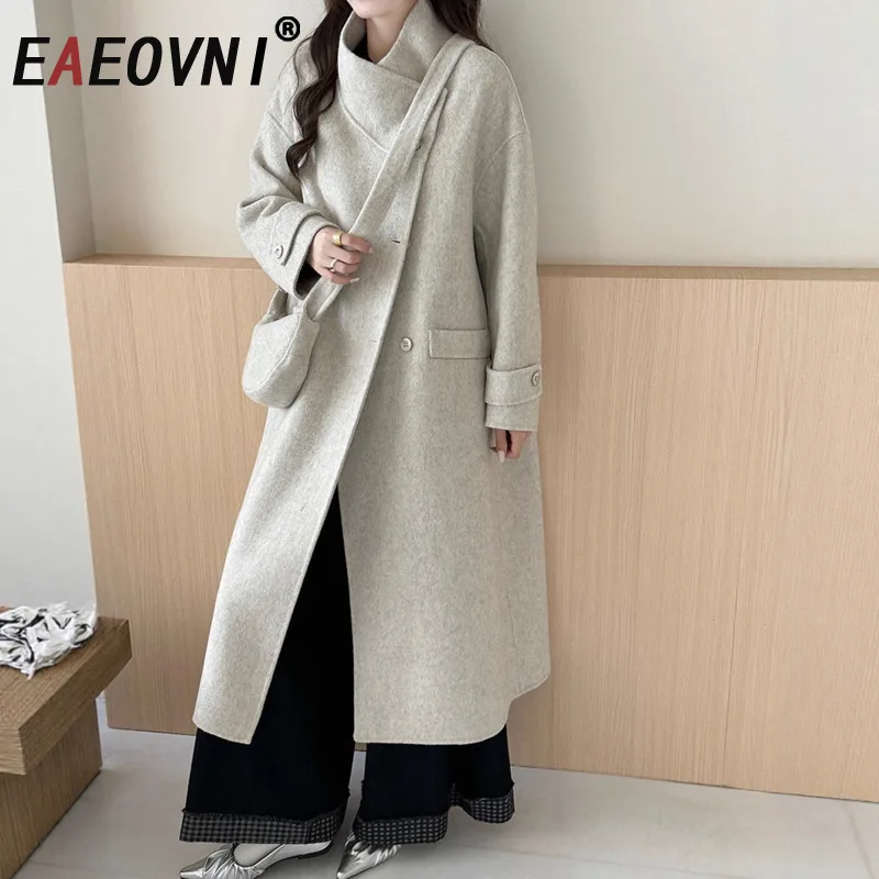 EAEOVNI модное шерстяное длинное пальто с сумкой, однотонное женское офисное женское свободное пальто на пуговицах, осень-зима, новая одежда
EAEOVNI модное шерстяное длинное пальто с сумкой, однотонное женское офисное женское свободное пальто на пуговицах, осень-зима, новая одежда