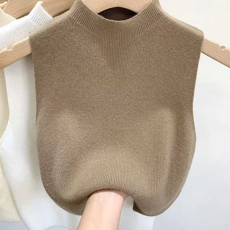 Женская вязаная майка, весенне-осенний тонкий свитер, жилет, полуводолазка, женские однотонные свитера без рукавов, пуловеры
Женская вязаная майка, весенне-осенний тонкий свитер, жилет, полуводолазка, женские однотонные свитера без рукавов, пуловеры