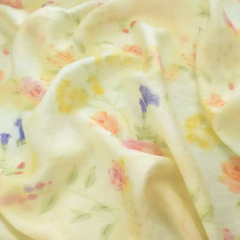 Yellow printed synthetic silk fabric, used for making dresses, clothing, and DIY sewing fabrics.
Yellow printed synthetic silk fabric, used for making dresses, clothing, and DIY sewing fabrics.
