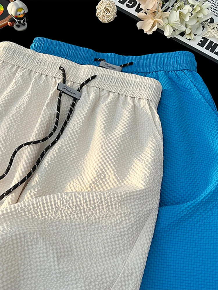 Мужские спортивные шорты-бриджи из ткани спор-бэббл, летние, тонкие, повседневные, свободного прямого кроя, быстросохнущие, дышащие, удобные, модные
Мужские спортивные шорты-бриджи из ткани спор-бэббл, летние, тонкие, повседневные, свободного прямого кроя, быстросохнущие, дышащие, удобные, модные