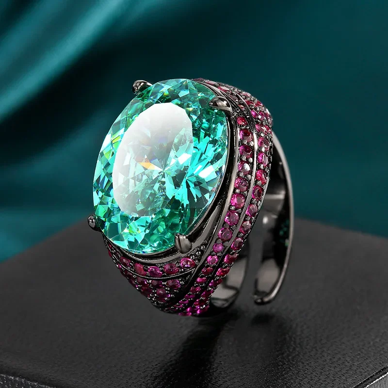 Adjustable Black Plated Ring with Prong Setting Oval Cut 13×18mm Teal Blue Gemstone Pink Blue CZ Accents Bold Statement Jewelry
Adjustable Black Plated Ring with Prong Setting Oval Cut 13×18mm Teal Blue Gemstone Pink Blue CZ Accents Bold Statement Jewelry