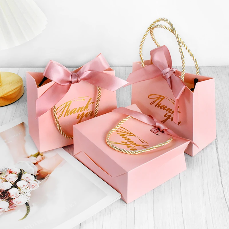 5/10PCS Wedding Pink Paper Thank You Candy Bags handles Bow Ribbon Guests Candy Gift Packing Bags Handbag Decoration Supplies
5/10PCS Wedding Pink Paper Thank You Candy Bags handles Bow Ribbon Guests Candy Gift Packing Bags Handbag Decoration Supplies