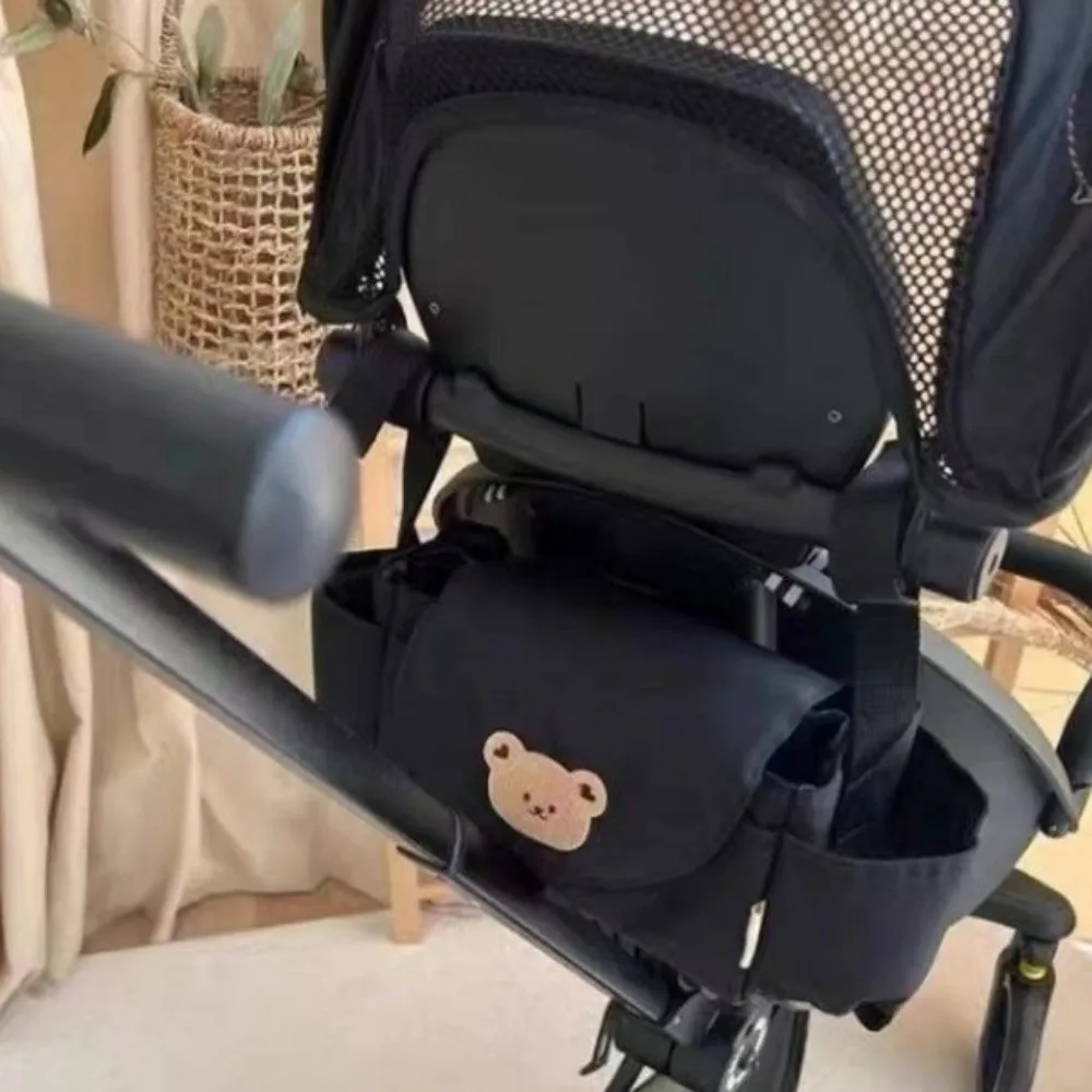 Fashion Cartoon Stroller Organizer Bag Bear Cloth Pram Storage Bag Mommy Bag Large Capacity Baby Stroller Bag Travel
Fashion Cartoon Stroller Organizer Bag Bear Cloth Pram Storage Bag Mommy Bag Large Capacity Baby Stroller Bag Travel