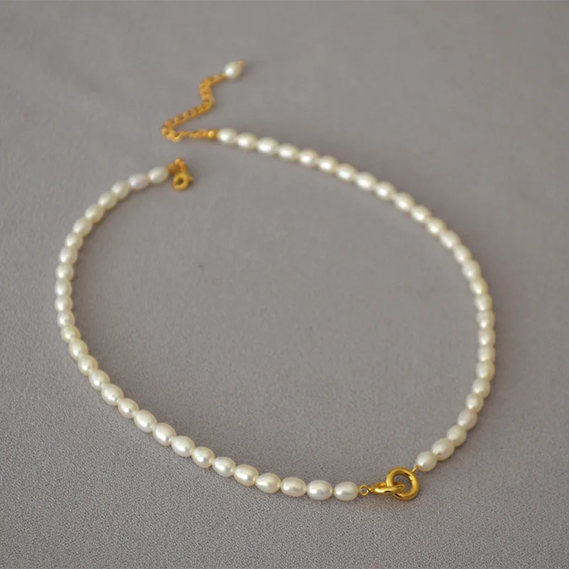 French Elegant Charming Freshwater Rice Pearl Double Ring Short Style Commuter Simple Necklace Clavicle Chain Classic Jewelry
French Elegant Charming Freshwater Rice Pearl Double Ring Short Style Commuter Simple Necklace Clavicle Chain Classic Jewelry