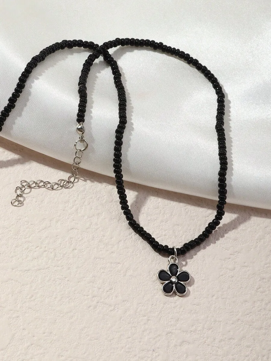 Black Beaded Necklace With Flower Charm For Women
Black Beaded Necklace With Flower Charm For Women