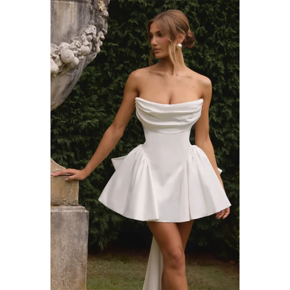 White Strapless Mini Prom Dresses 2025 Ruched Neck Sleeveless Evening Dress Luxury Satin Lace-up Customized Party Gown with Bow
White Strapless Mini Prom Dresses 2025 Ruched Neck Sleeveless Evening Dress Luxury Satin Lace-up Customized Party Gown with Bow