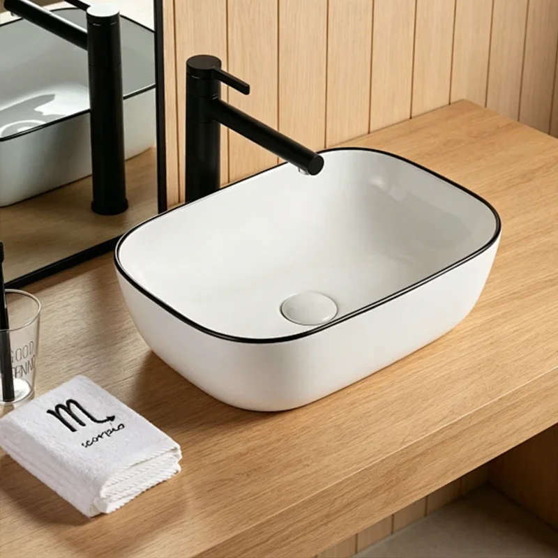 46Cm*32Cm Oval-Shaped Ceramic Washbasin with Black Edges, Ideal for Modern Bathroom Fixtures, Suitable for Changing Rooms, Vanity Tables, Bathrooms, Toilets, and Rvs
46Cm*32Cm Oval-Shaped Ceramic Washbasin with Black Edges, Ideal for Modern Bathroom Fixtures, Suitable for Changing Rooms, Vanity Tables, Bathrooms, Toilets, and Rvs