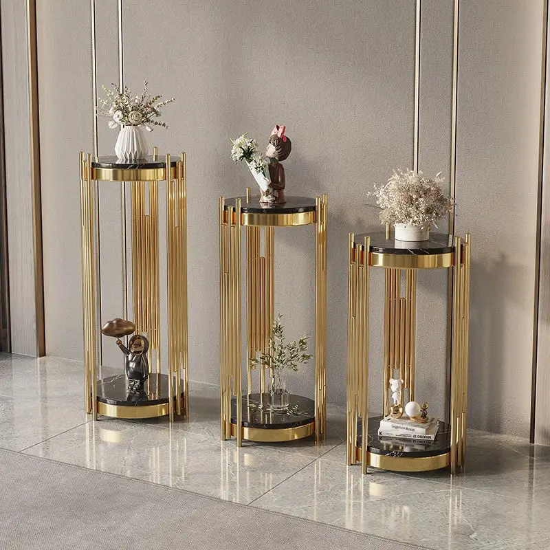 Light luxury marble flower stand, stainless steel rack in living room, floor-to-ceiling ornament next to TV
Light luxury marble flower stand, stainless steel rack in living room, floor-to-ceiling ornament next to TV