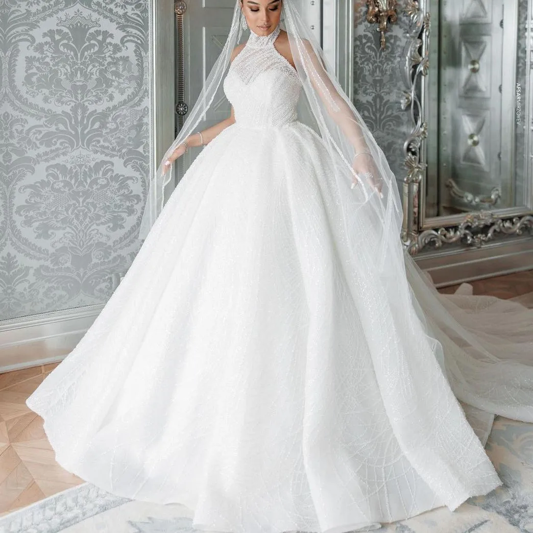 Elegant Ball Gown Wedding Dresses Sleeveless High Neck Halter Sequins Ruffles Appliques Lace-up Bridal Gowns Vestina De Novia
Elegant Ball Gown Wedding Dresses Sleeveless High Neck Halter Sequins Ruffles Appliques Lace-up Bridal Gowns Vestina De Novia