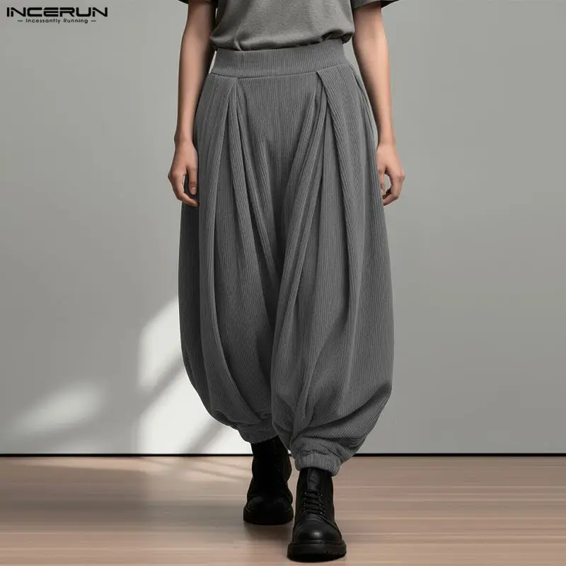 Мужские брюки-шаровары INCERUN, однотонные, с эластичным поясом, джоггеры, повседневные брюки с заниженной проймой, мужская уличная одежда, модные свободные брюки 2026 года
Мужские брюки-шаровары INCERUN, однотонные, с эластичным поясом, джоггеры, повседневные брюки с заниженной проймой, мужская уличная одежда, модные свободные брюки 2026 года