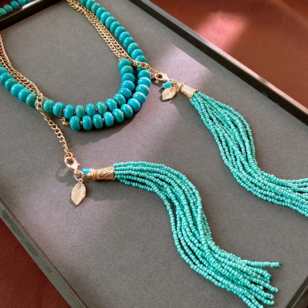 Hanging Neck Long Turquoise Necklace Rice Beads Turquoise Bohemian Waist Chain Tassel Pendant Jewelry Accessories Sweater Chain
Hanging Neck Long Turquoise Necklace Rice Beads Turquoise Bohemian Waist Chain Tassel Pendant Jewelry Accessories Sweater Chain