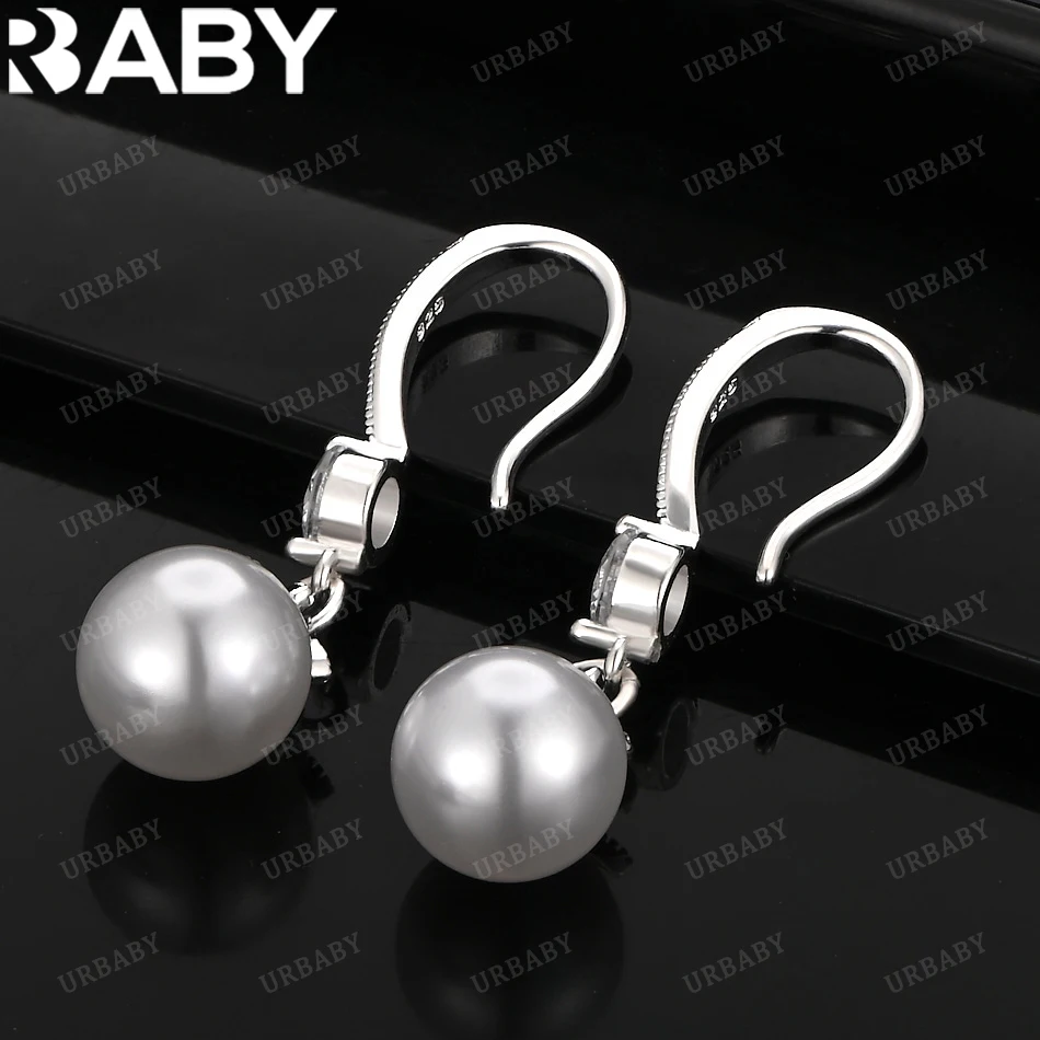 URBABY 925 Sterling Silver 10mm&12mm Pearl Drop Earrings For Women Fashion Designer Jewelry Party Wedding Accessories Gifts
URBABY 925 Sterling Silver 10mm&12mm Pearl Drop Earrings For Women Fashion Designer Jewelry Party Wedding Accessories Gifts
