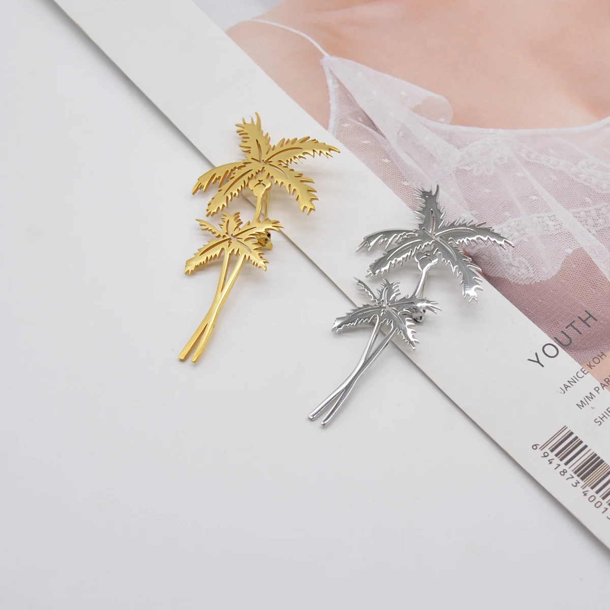 Fashionable Titanium Steel Coconut Tree Brooch New Youth High-end Color Preserving All-match Brooch Popular Clothing
Fashionable Titanium Steel Coconut Tree Brooch New Youth High-end Color Preserving All-match Brooch Popular Clothing