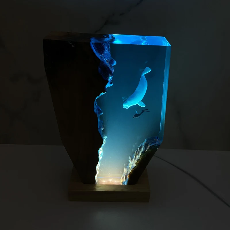 Resin Light Beluga whales Swim Together Theme Creative Artistic Beautiful Night Light Craft Decoration USB Table Lamp
Resin Light Beluga whales Swim Together Theme Creative Artistic Beautiful Night Light Craft Decoration USB Table Lamp