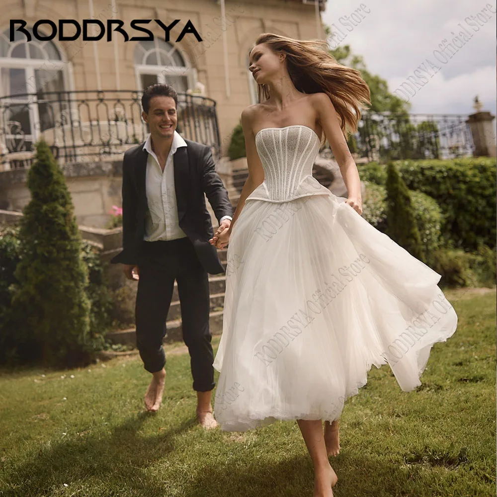 RODDRSYA Strapless A-Line Bride Dresses Sleeveless Elegant Tulle Mid robe de mariée Lace Backless Wedding Party Gowns Customized
RODDRSYA Strapless A-Line Bride Dresses Sleeveless Elegant Tulle Mid robe de mariée Lace Backless Wedding Party Gowns Customized
