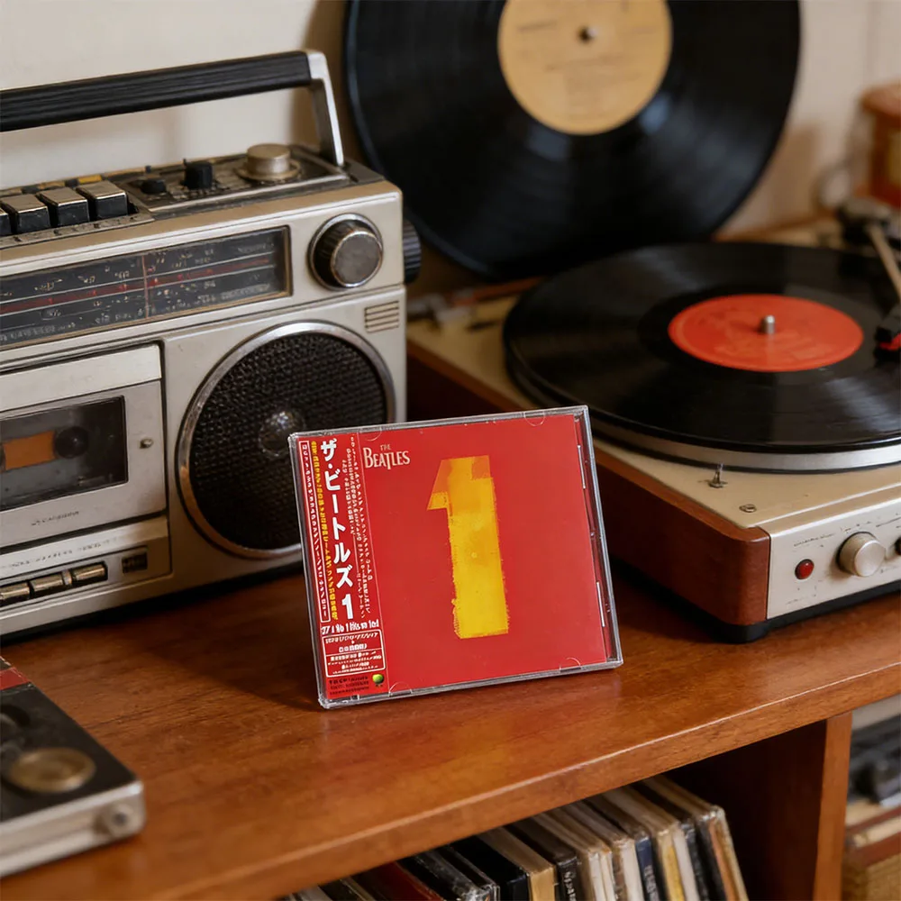CD '1' Is A Greatest Hits Album By The Beatles and Is Also One of The World's Most Commercially Influential Compilation Albums.
CD '1' Is A Greatest Hits Album By The Beatles and Is Also One of The World's Most Commercially Influential Compilation Albums.