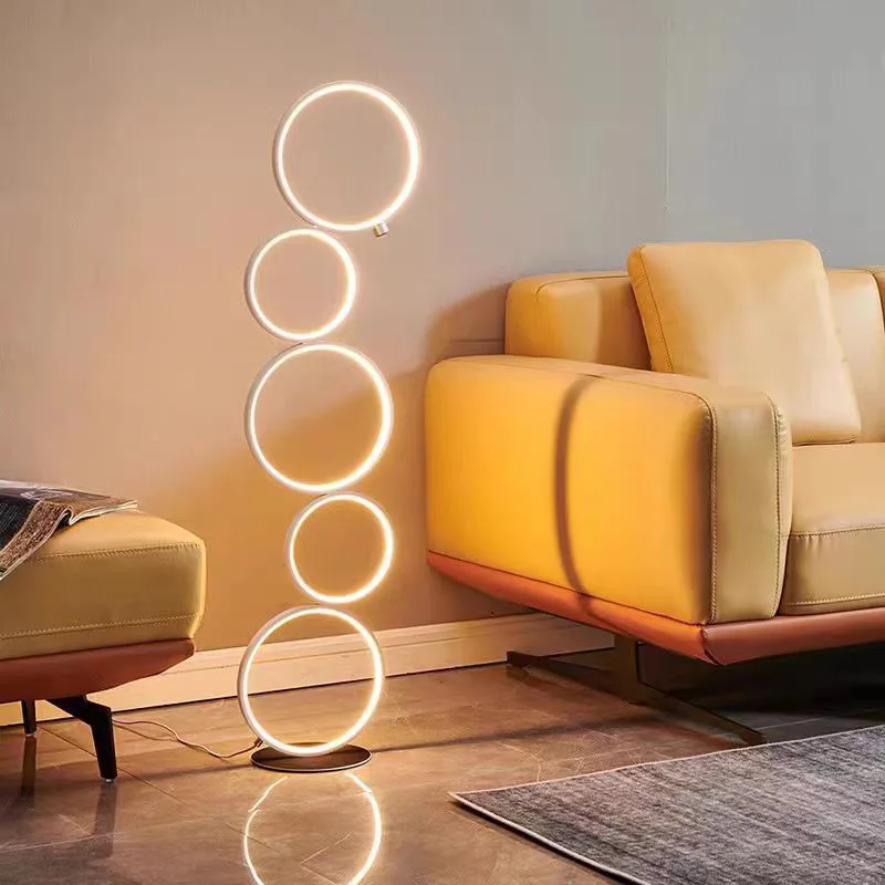 Nordic creative floor lamp simple living room sofa bedroom bedside five-ring design background decoration ornament atmosphere
Nordic creative floor lamp simple living room sofa bedroom bedside five-ring design background decoration ornament atmosphere